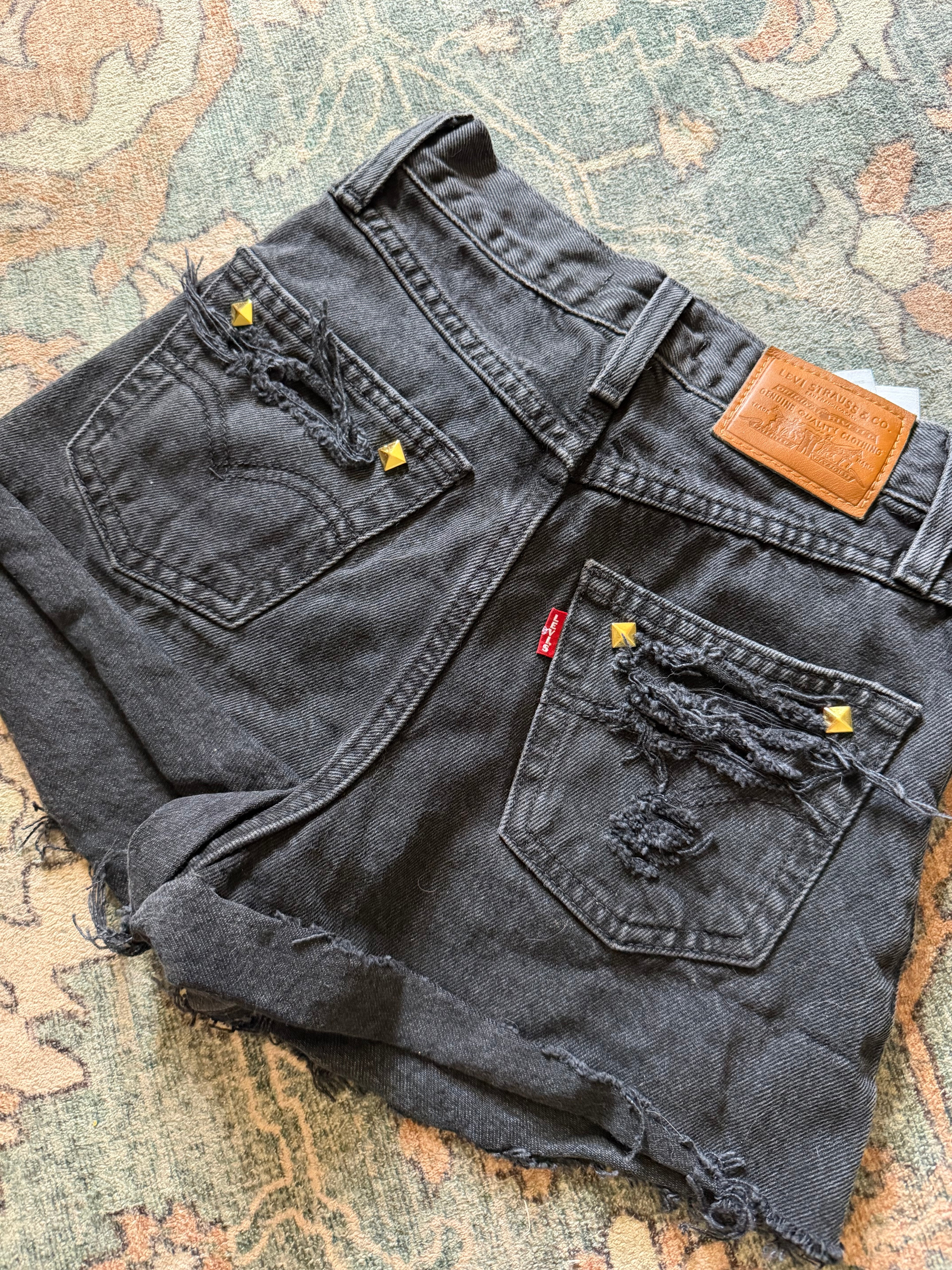 Custom studded Levi’s size 23