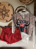 Custom red Levi’s size 27