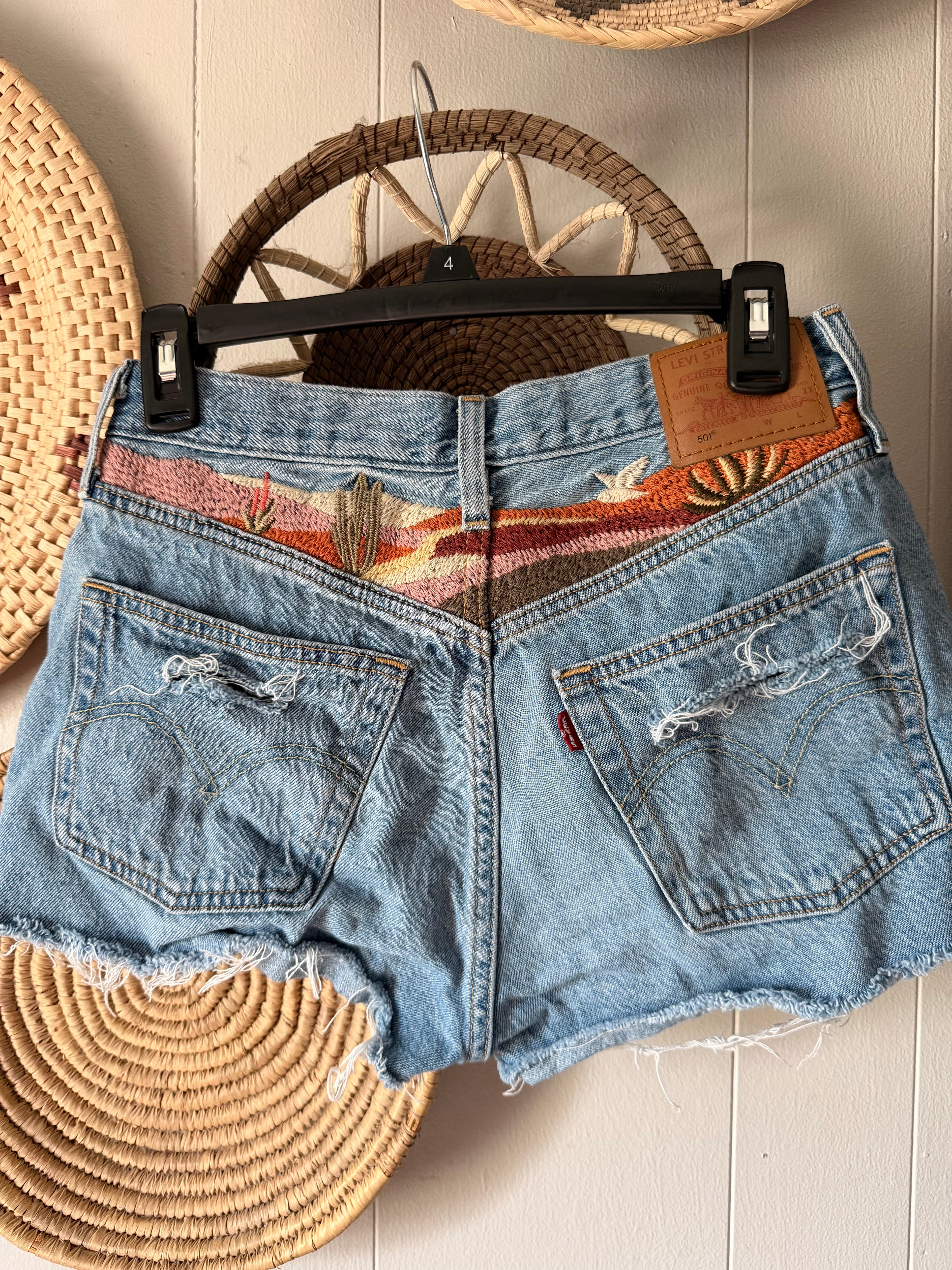Custom distressed western theme Levi’s size 27