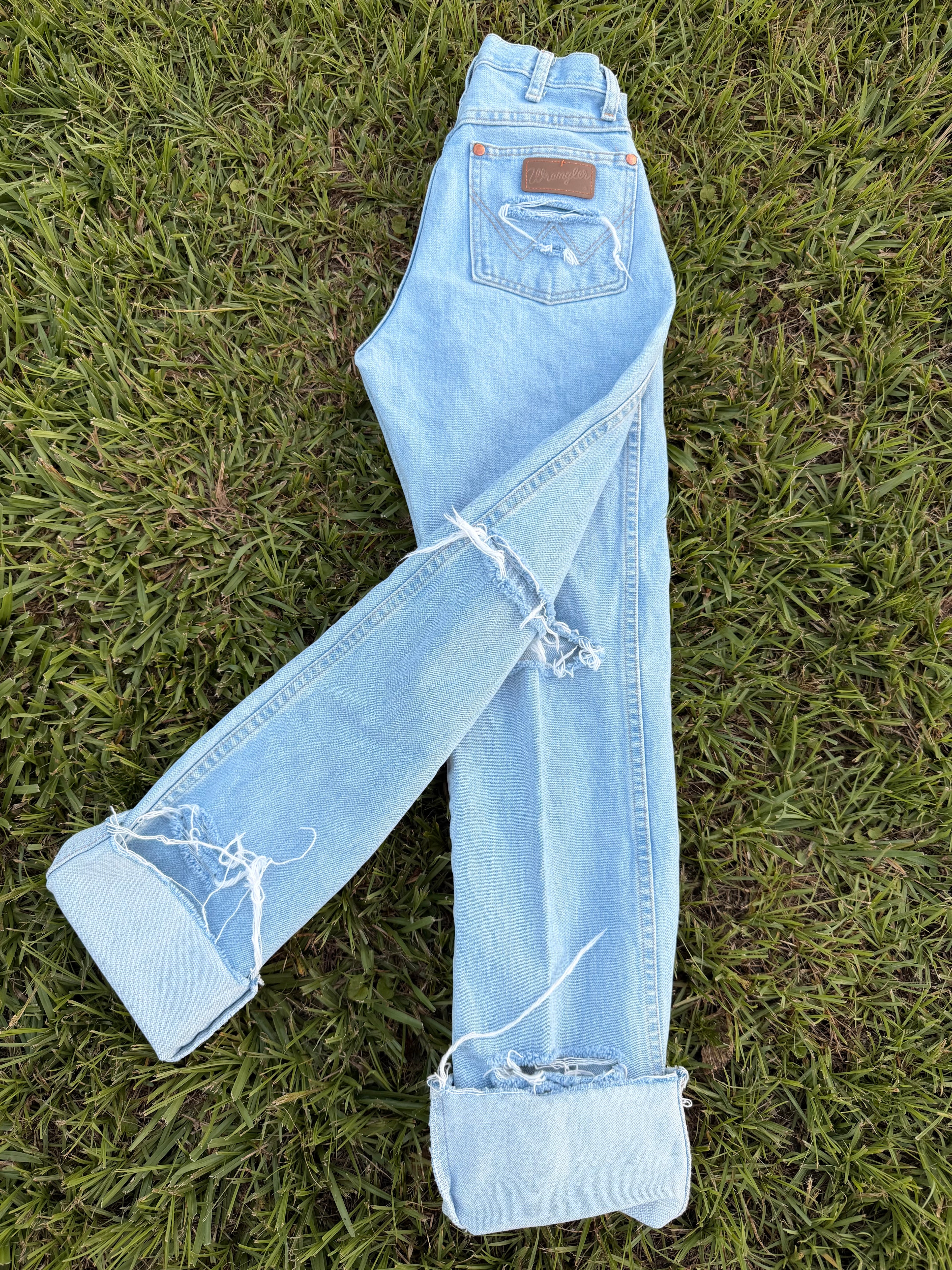 Custom light wash wrangler size 1