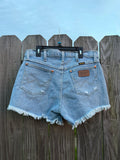 Custom distress Wrangler shorts