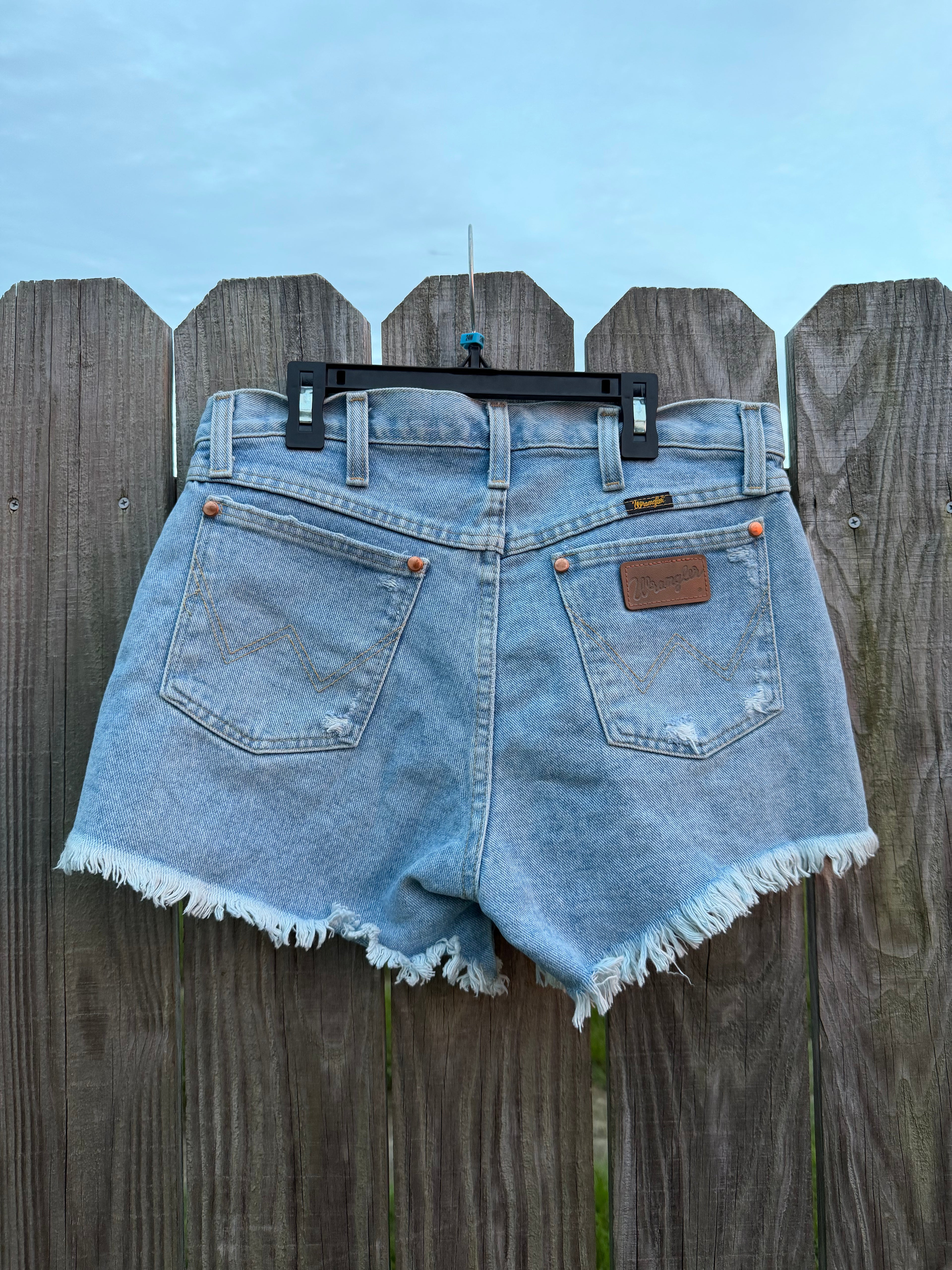 Custom distress Wrangler shorts