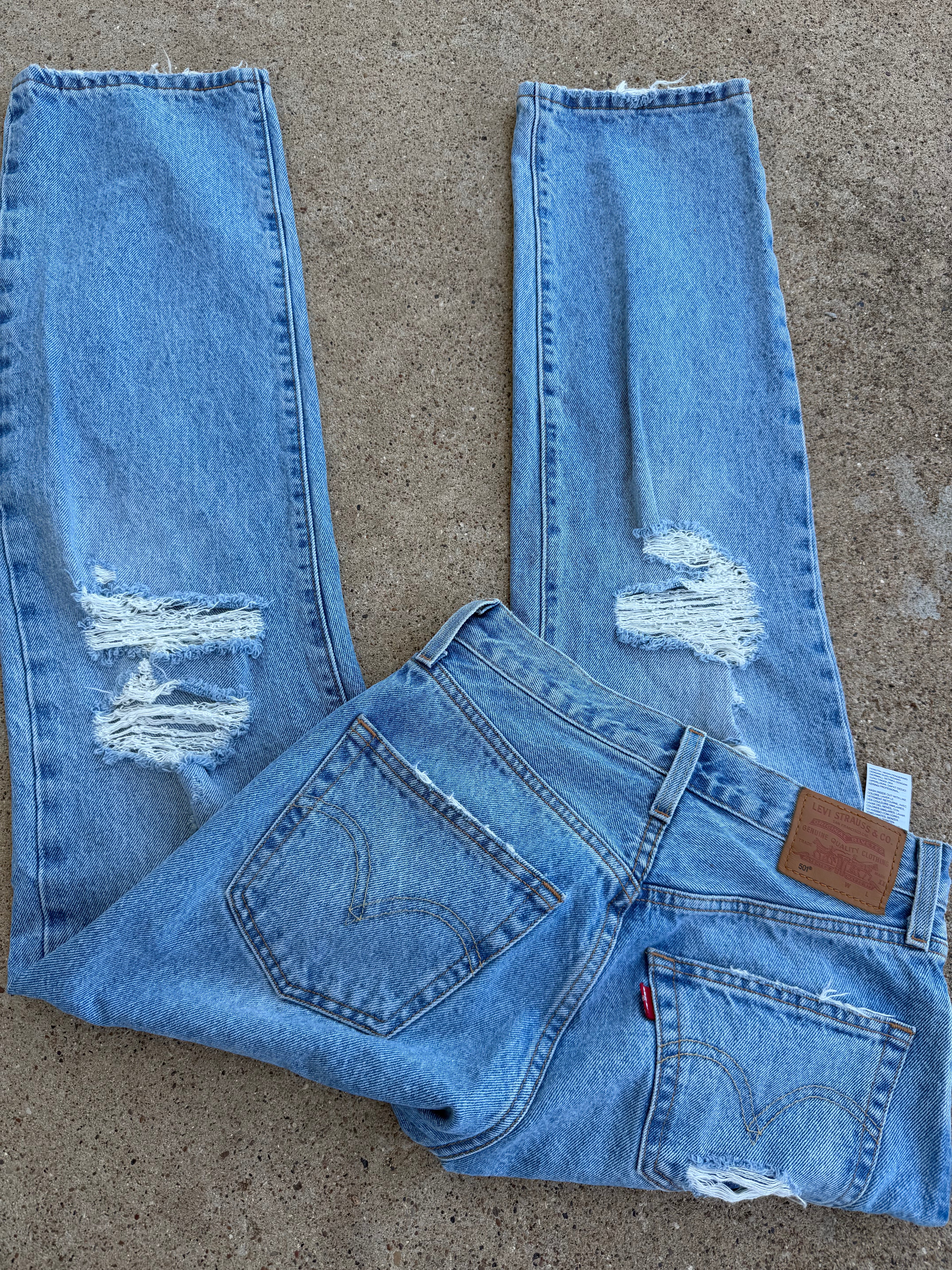 Custom distressed Levi’s size 24