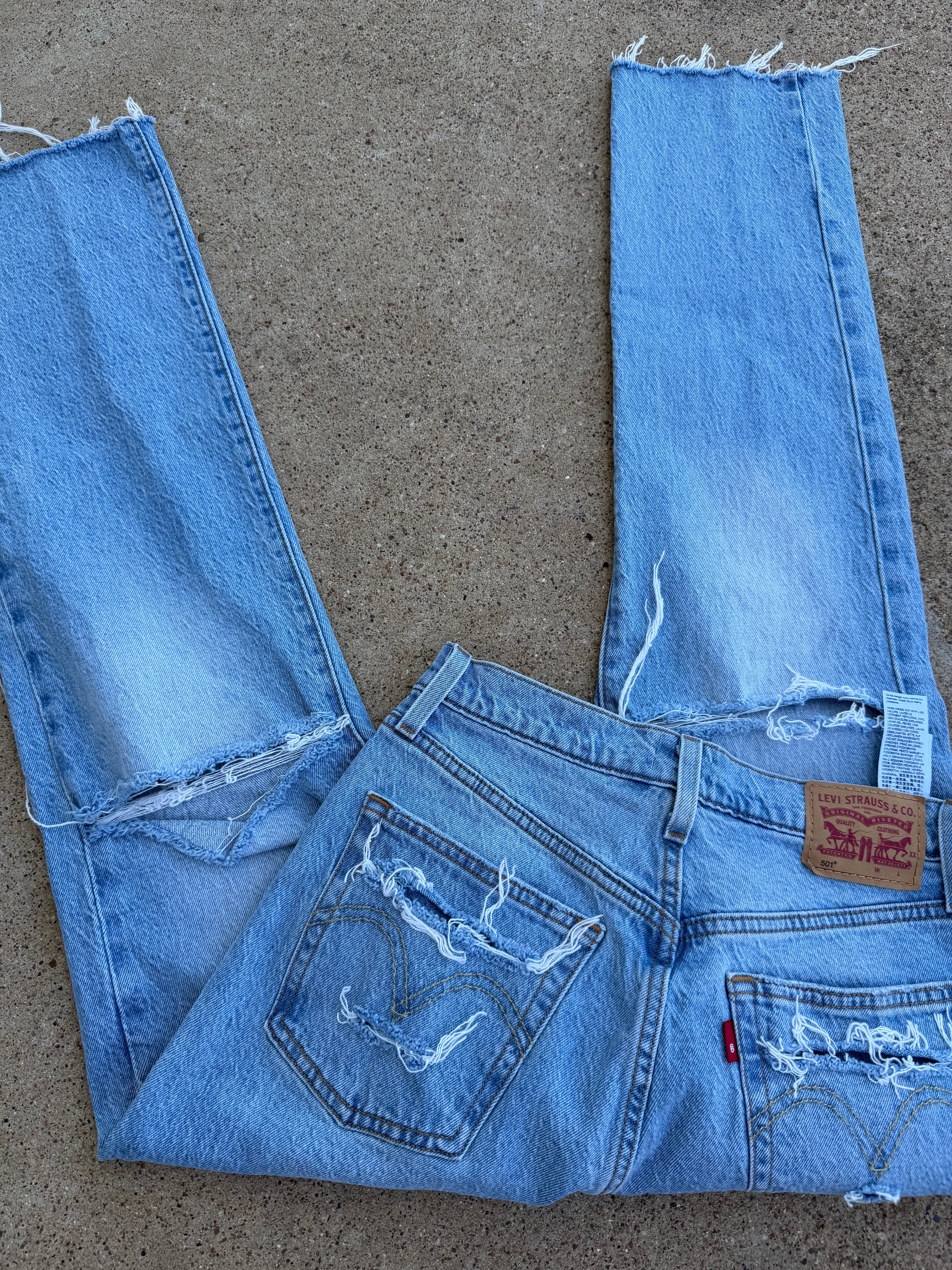 Custom distressed Levi’s size 26
