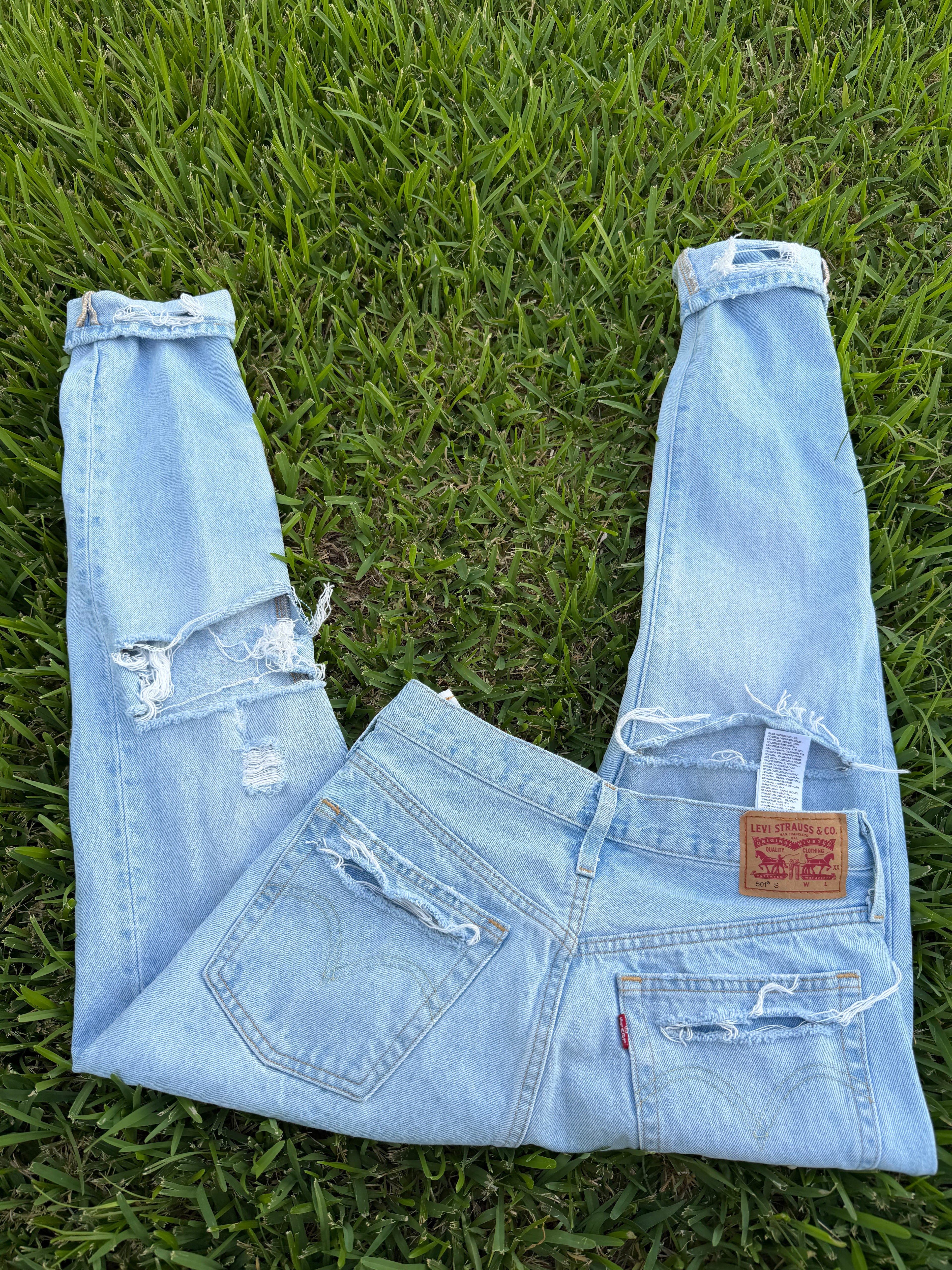 Custom distressed Levi’s size 27