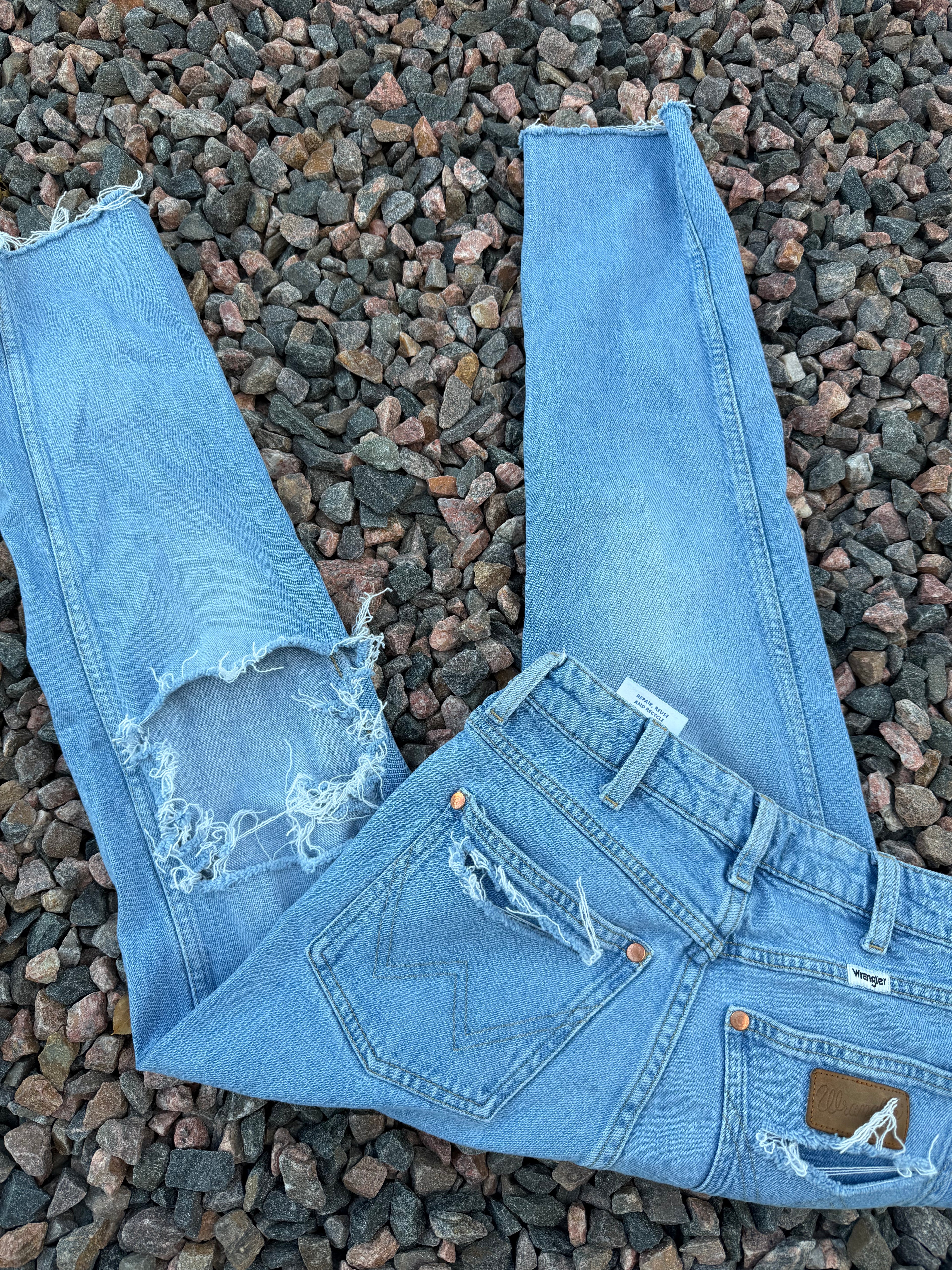Custom distressed wrangler size 25